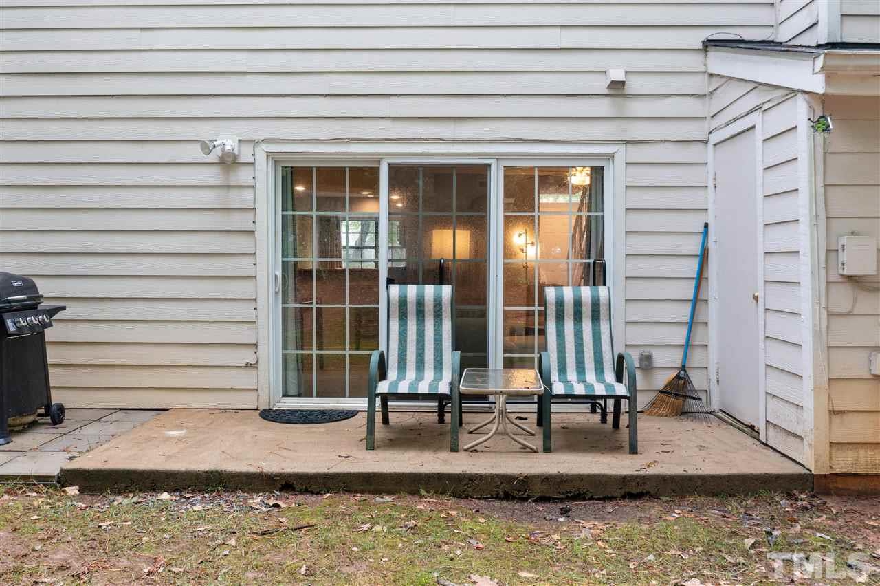 2453 Condor Court, Unit 2453 Raleigh, NC 27615 - Photo 22 of 26 a front view of a house with a yard