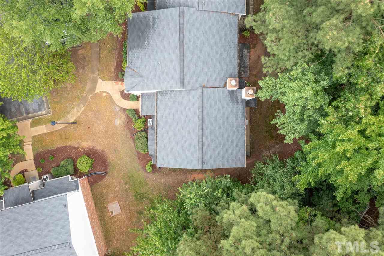 2453 Condor Court, Unit 2453 Raleigh, NC 27615 - Photo 24 of 26 an aerial view of a house having yard