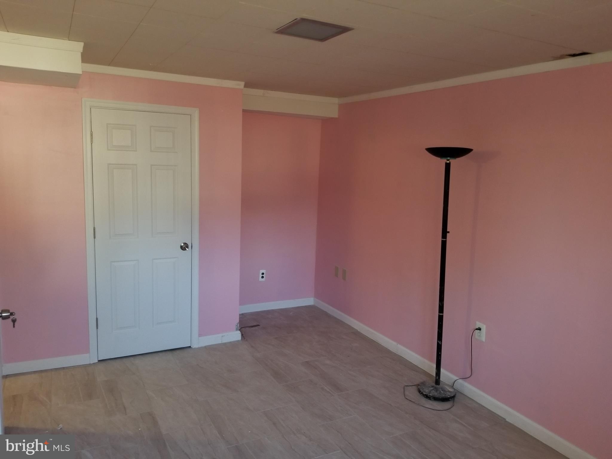 2708 Rambler Place Adelphi, MD 20783 - Photo 34 of 41 a view of a room with wooden floor