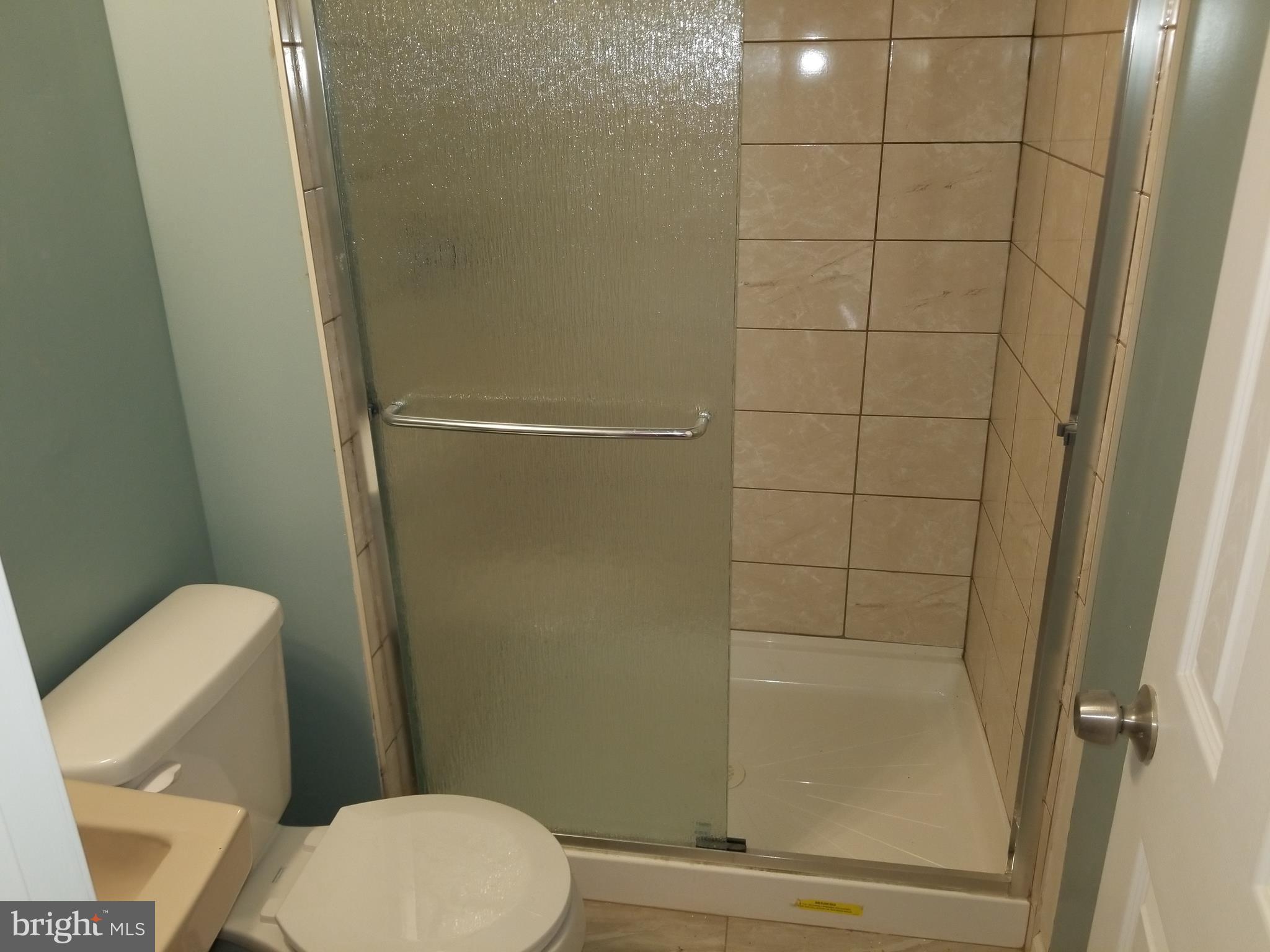 2708 Rambler Place Adelphi, MD 20783 - Photo 38 of 41 a bathroom with a toilet and a shower