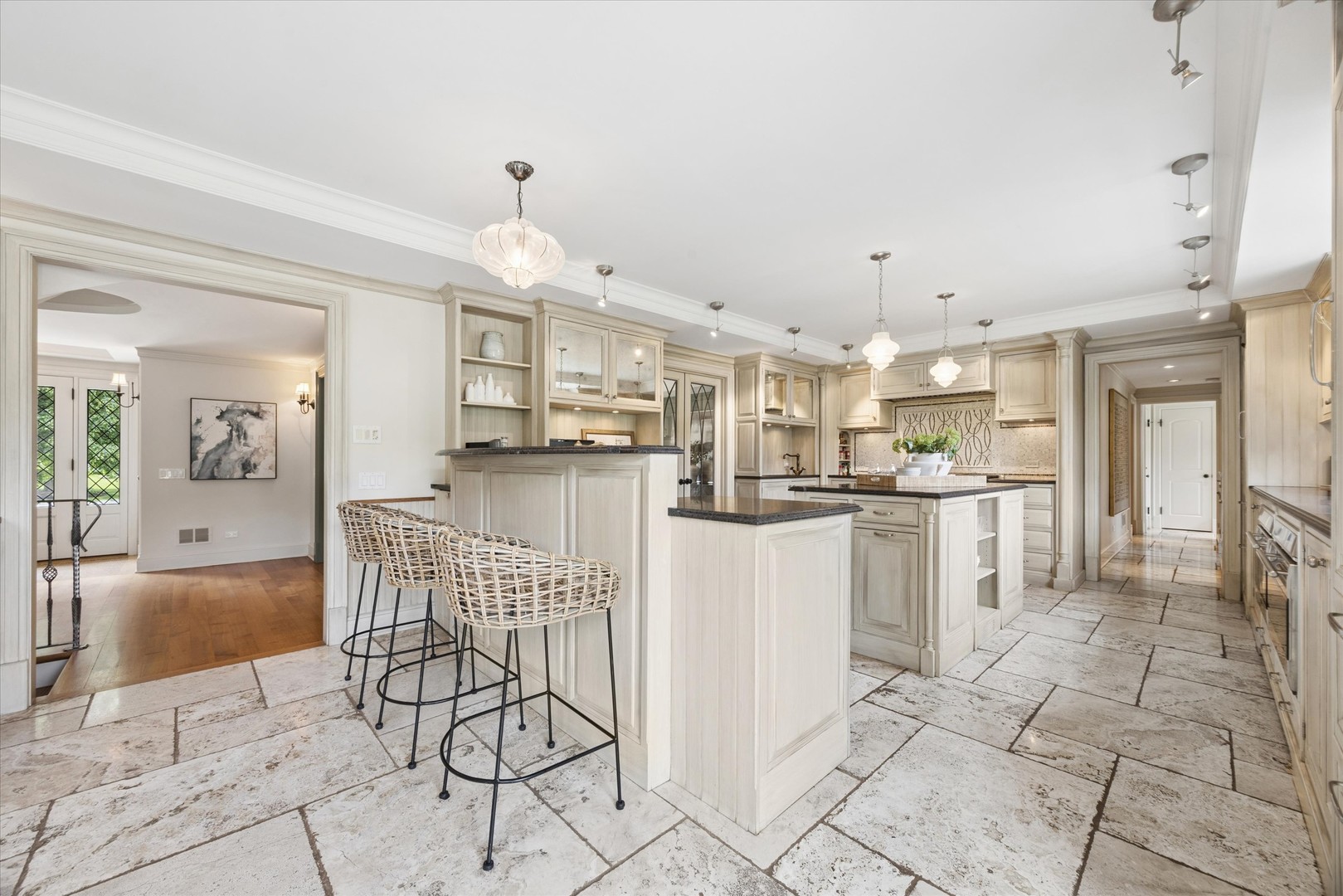 325 Princeton Road Hinsdale, IL 60521 - Photo 9 of 55 a kitchen with white cabinets and refrigerator