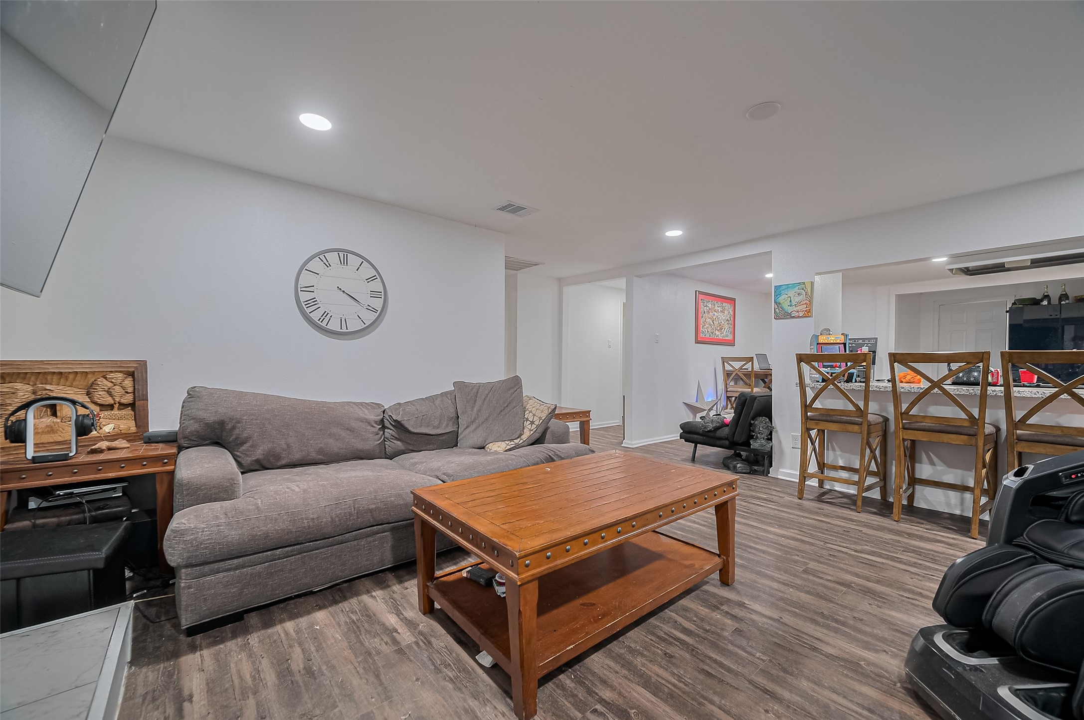 523 County Road 2073 Hull, TX 77564 - Photo 3 of 13 a living room with furniture kitchen view and a wooden floor