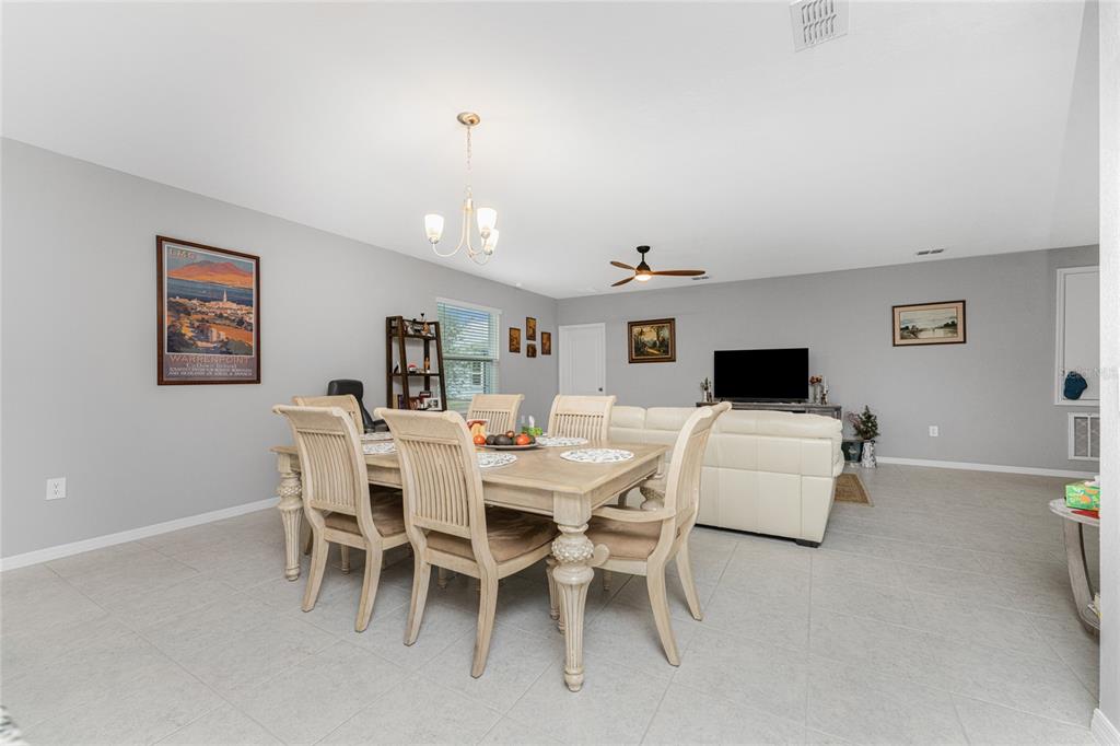 475 Posadas Circle Punta Gorda, FL 33983 - Photo 17 of 54 a living room with furniture and a flat screen tv