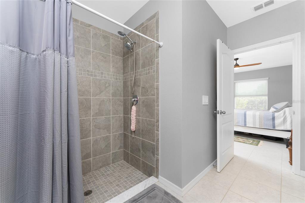 475 Posadas Circle Punta Gorda, FL 33983 - Photo 24 of 54 a bathroom with a shower and a sink