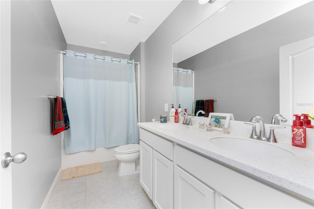 475 Posadas Circle Punta Gorda, FL 33983 - Photo 29 of 54 a bathroom with a sink and a mirror