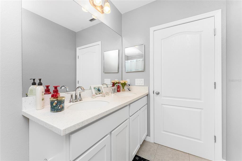 475 Posadas Circle Punta Gorda, FL 33983 - Photo 31 of 54 a bathroom with a sink and a mirror