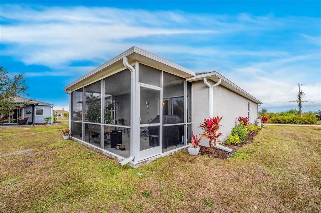 475 Posadas Circle Punta Gorda, FL 33983 - Photo 39 of 54 a view of an house with backyard space and garden