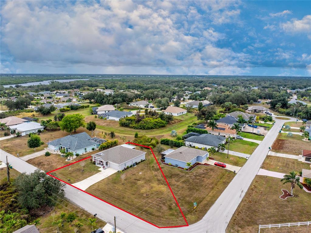 475 Posadas Circle Punta Gorda, FL 33983 - Photo 49 of 54 an aerial view of residential houses with outdoor space