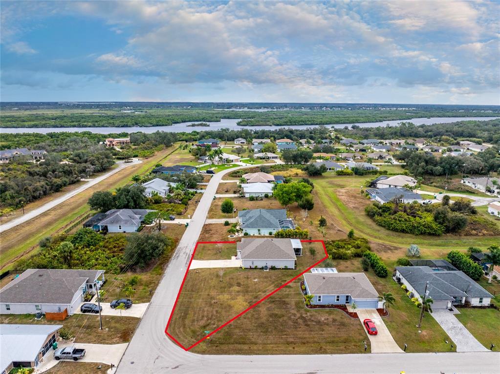 475 Posadas Circle Punta Gorda, FL 33983 - Photo 50 of 54 an aerial view of residential houses with outdoor space