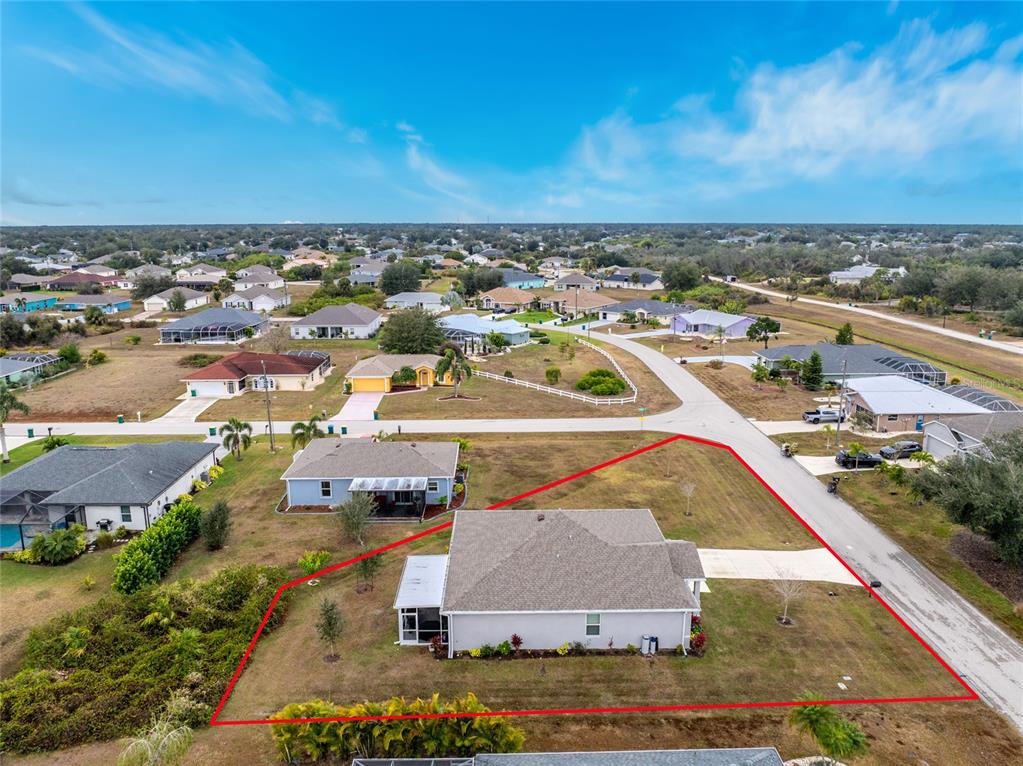 475 Posadas Circle Punta Gorda, FL 33983 - Photo 53 of 54 an aerial view of residential houses with outdoor space