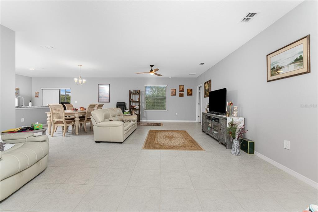 475 Posadas Circle Punta Gorda, FL 33983 - Photo 6 of 54 a living room with furniture and a flat screen tv