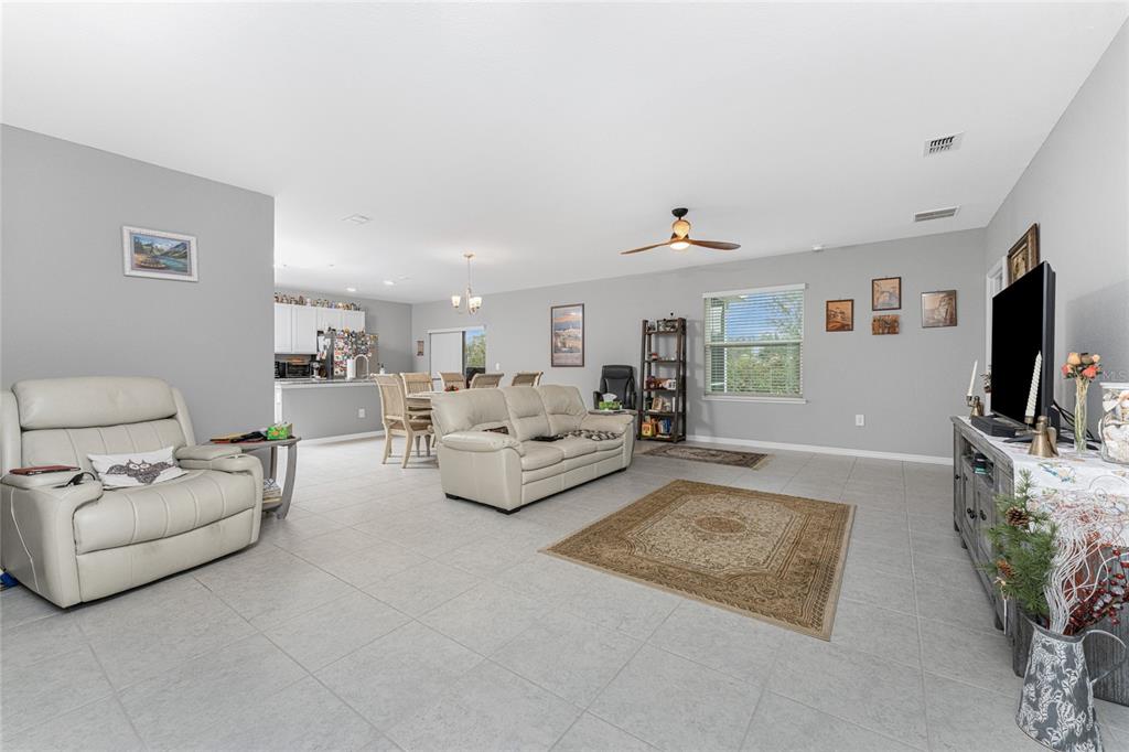 475 Posadas Circle Punta Gorda, FL 33983 - Photo 7 of 54 a living room with furniture and a flat screen tv