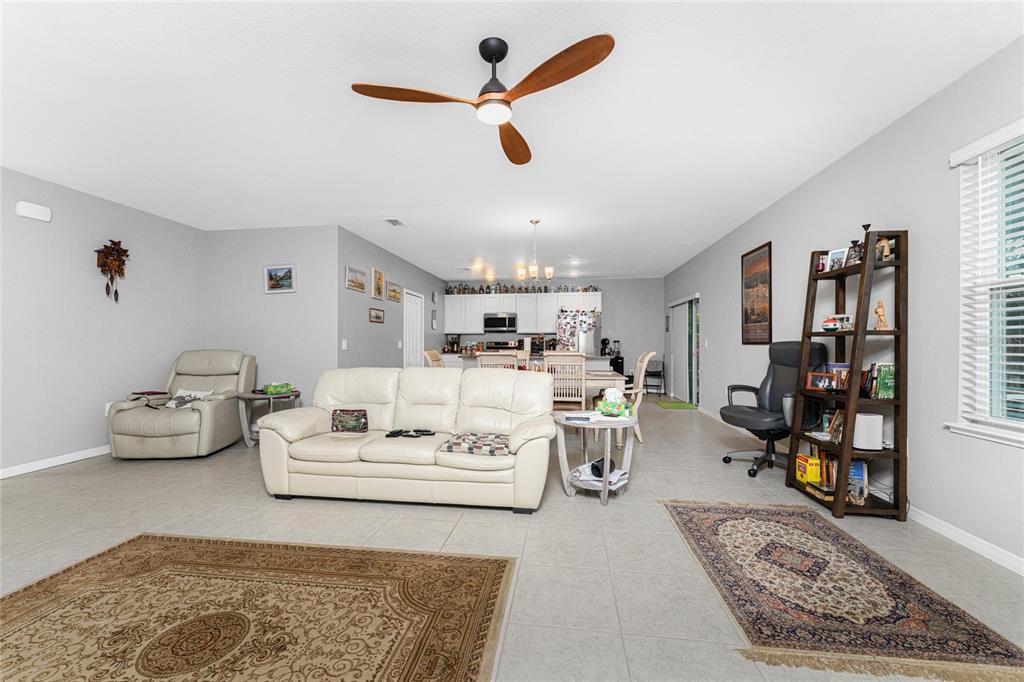 475 Posadas Circle Punta Gorda, FL 33983 - Photo 9 of 54 a living room with furniture rug and window