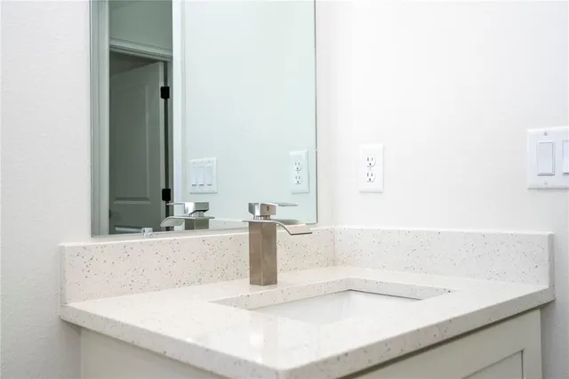 a view of a refrigerator in a kitchen