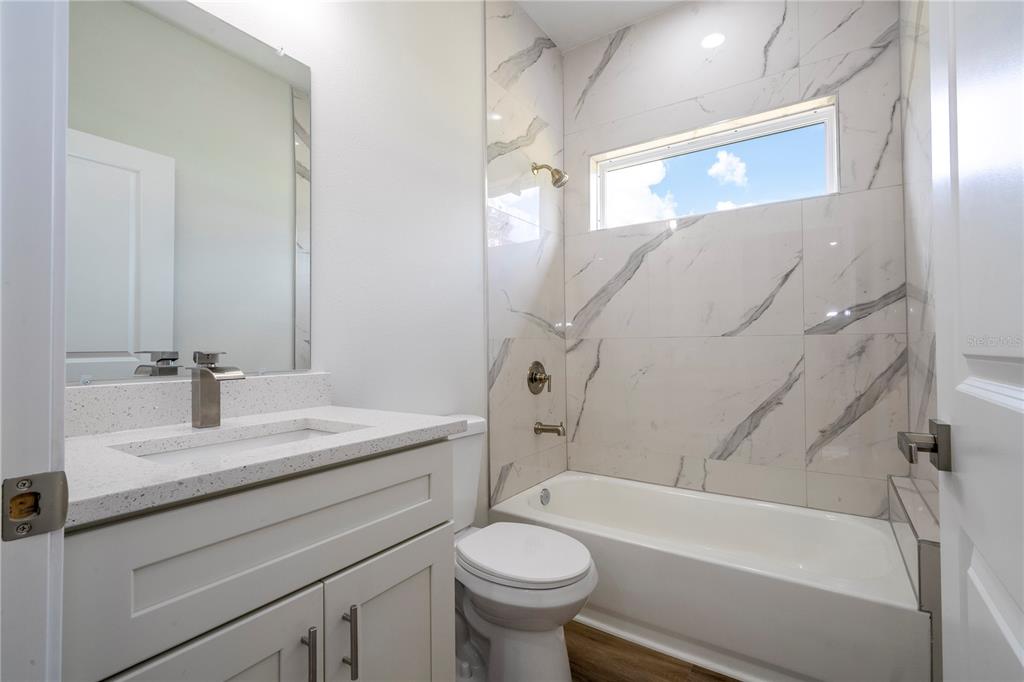 3998 Southwest 157th Place Road Ocala, FL 34473 - Photo 46 of 88 a bathroom with a sink a toilet and a bathtub