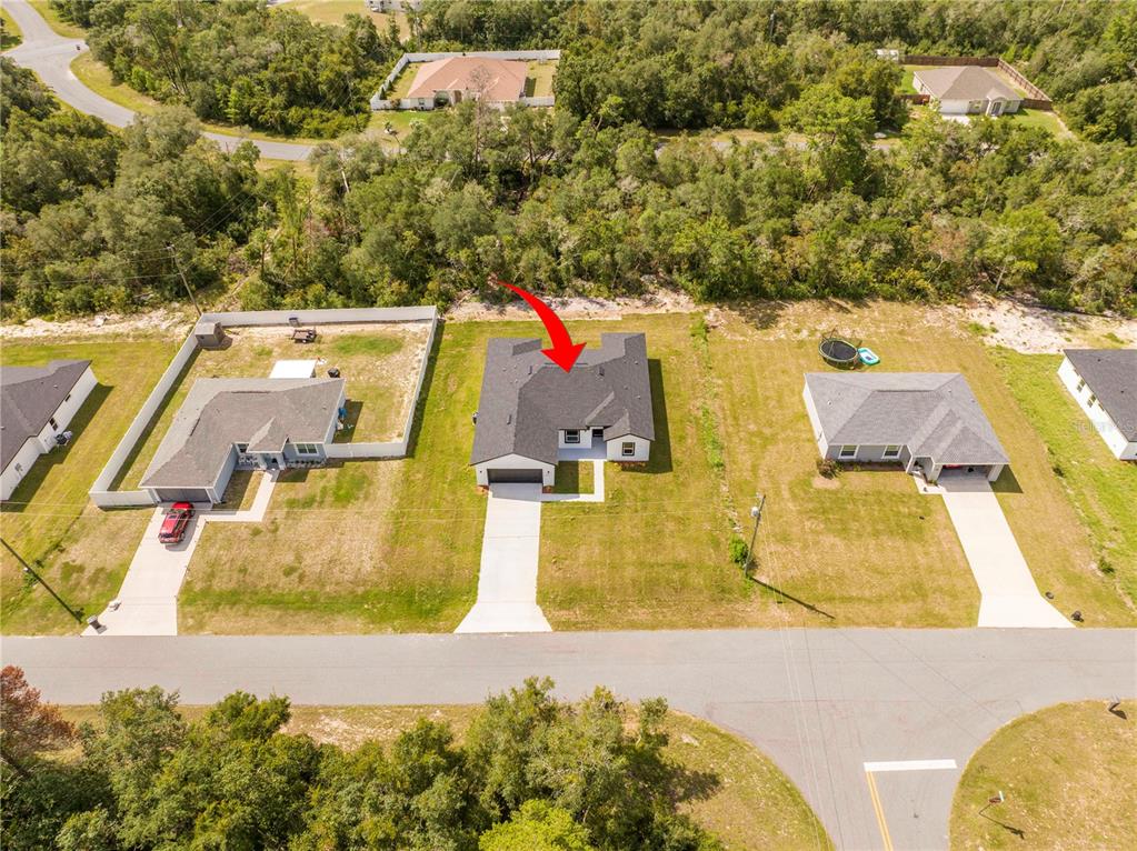 3998 Southwest 157th Place Road Ocala, FL 34473 - Photo 5 of 88 an aerial view of residential houses with outdoor space