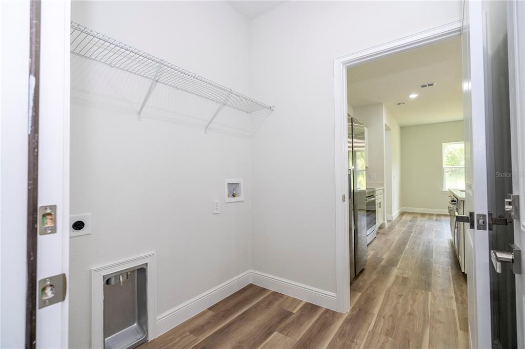 3998 Southwest 157th Place Road Ocala, FL 34473 - Photo 56 of 88 a view of a room with wooden floor