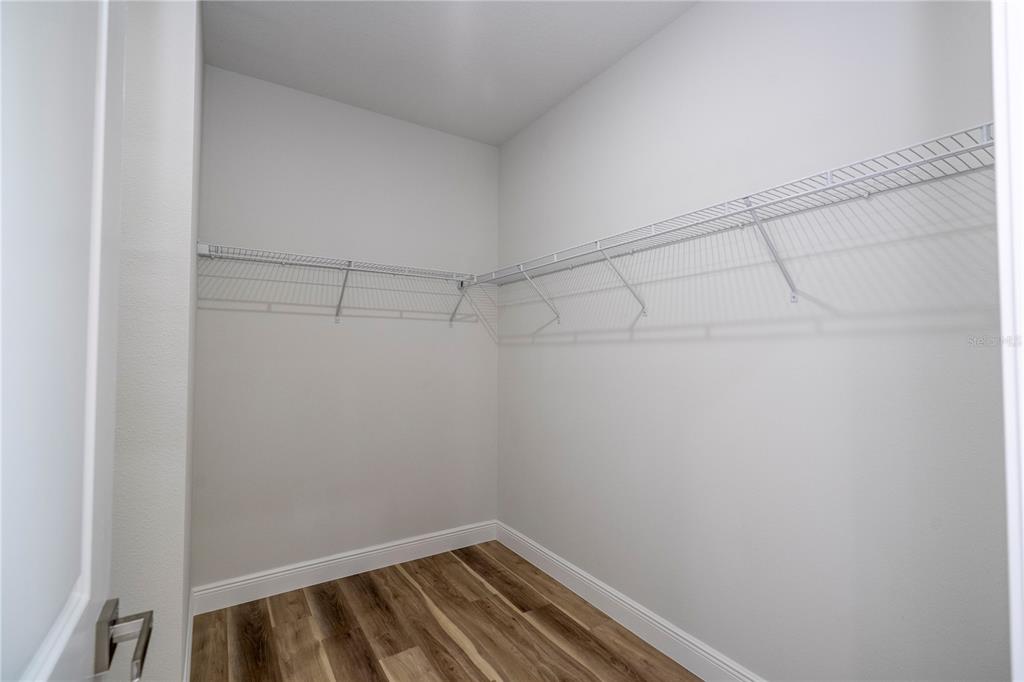 3998 Southwest 157th Place Road Ocala, FL 34473 - Photo 72 of 88 a view of a room with racks on the wall