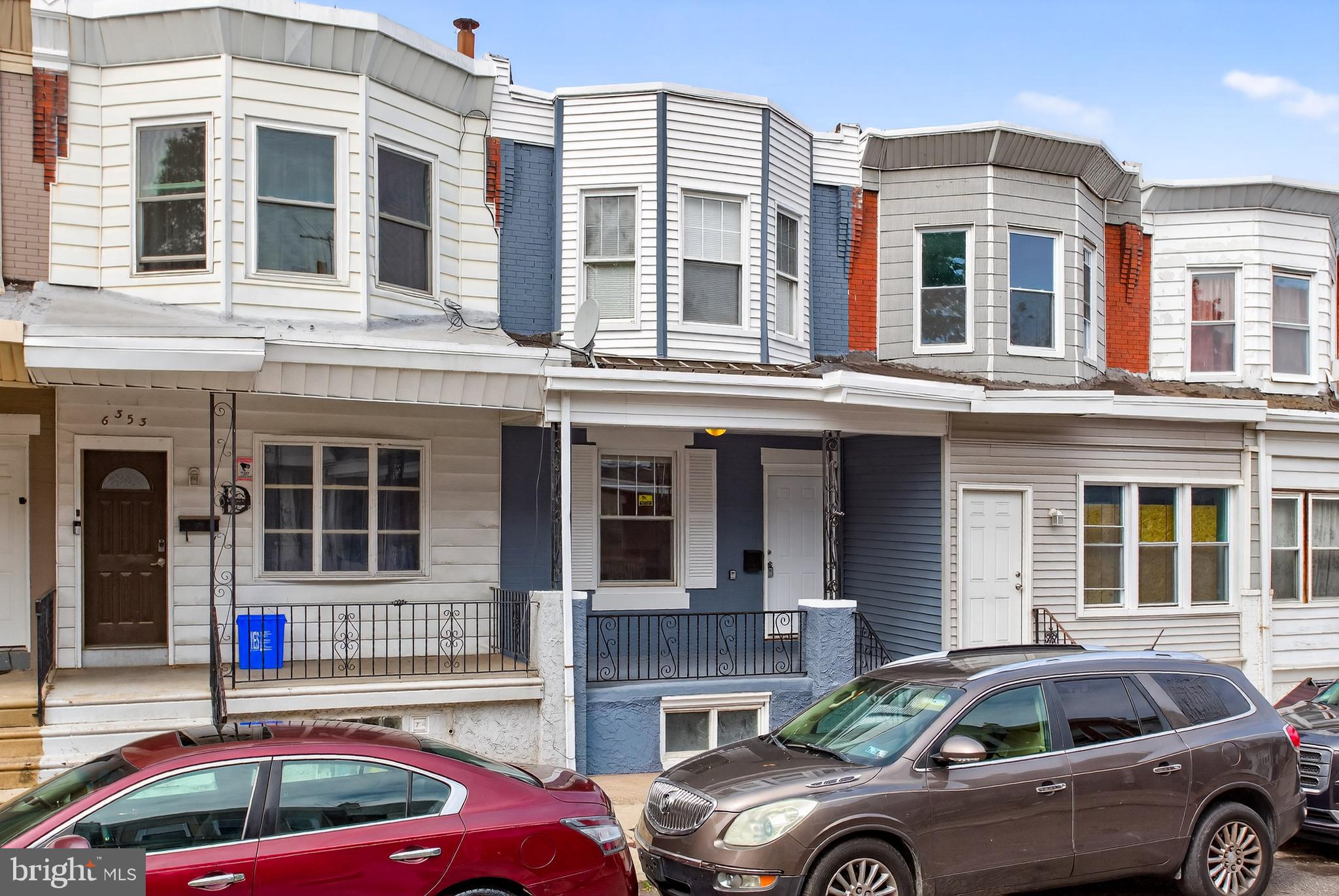 6351 Reedland Street Philadelphia, PA 19142 - Photo 2 of 30 a front view of a house with car parked