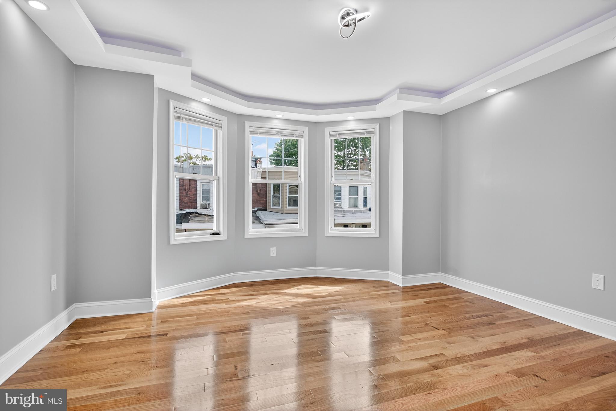 6351 Reedland Street Philadelphia, PA 19142 - Photo 24 of 30 a view of empty room with wooden floor and fan
