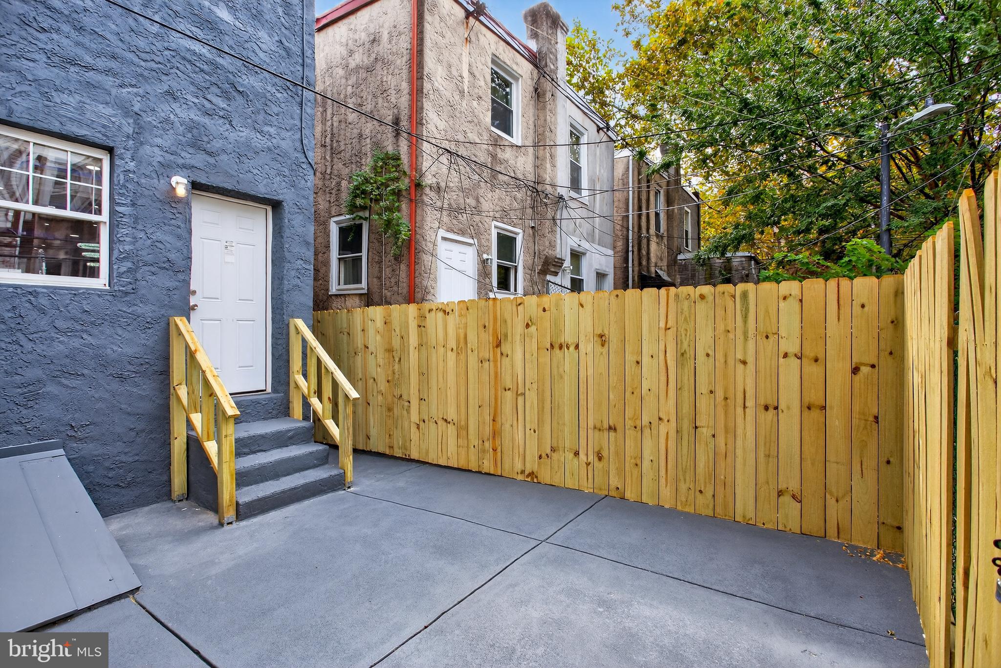 6351 Reedland Street Philadelphia, PA 19142 - Photo 30 of 30 a view of wooden house with a wooden fence