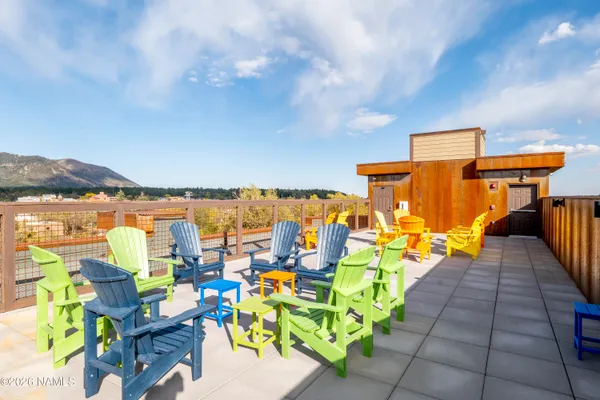 a view of a street with cars