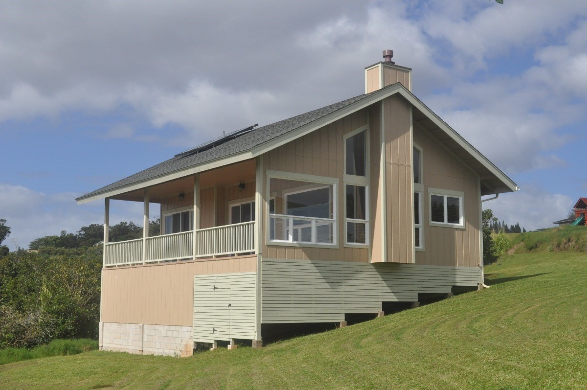 5495 A Puulima Road, Unit D Kalaheo, HI 96741 - Photo 11 of 24 a front view of a house with a yard