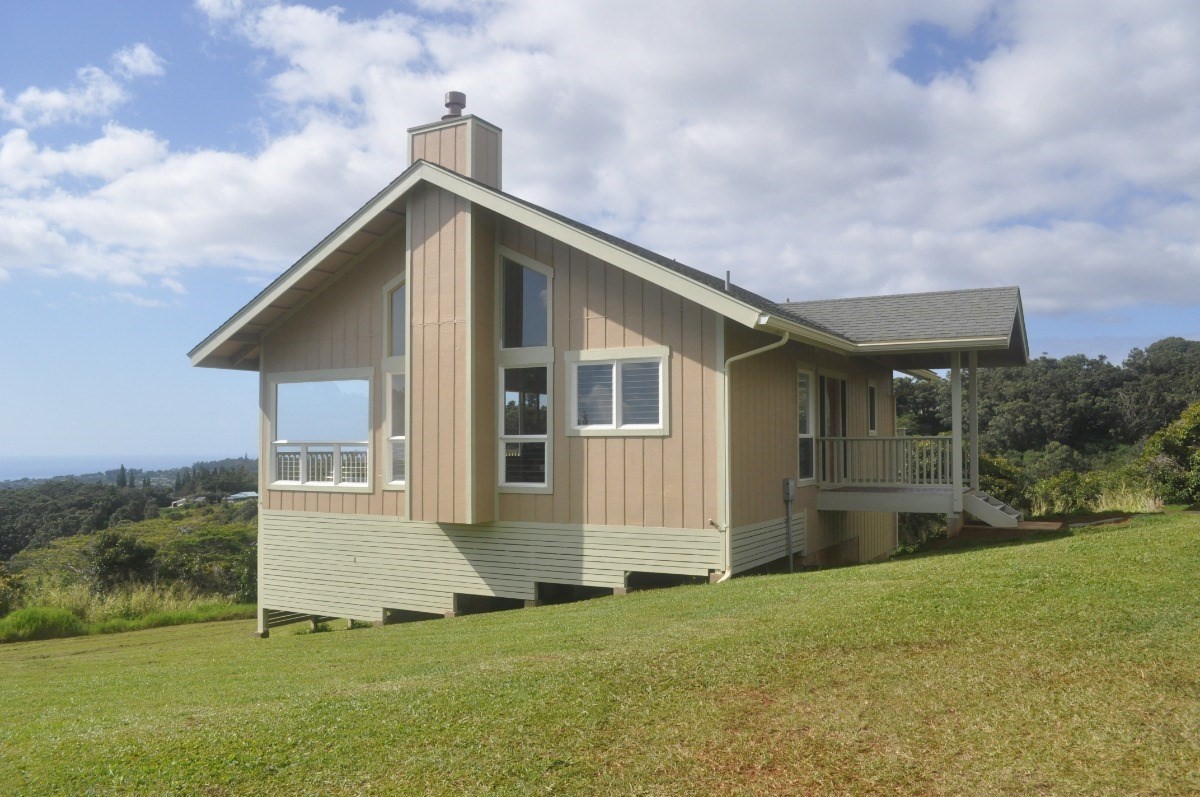 5495 A Puulima Road, Unit D Kalaheo, HI 96741 - Photo 12 of 24 a front view of house with yard and green space