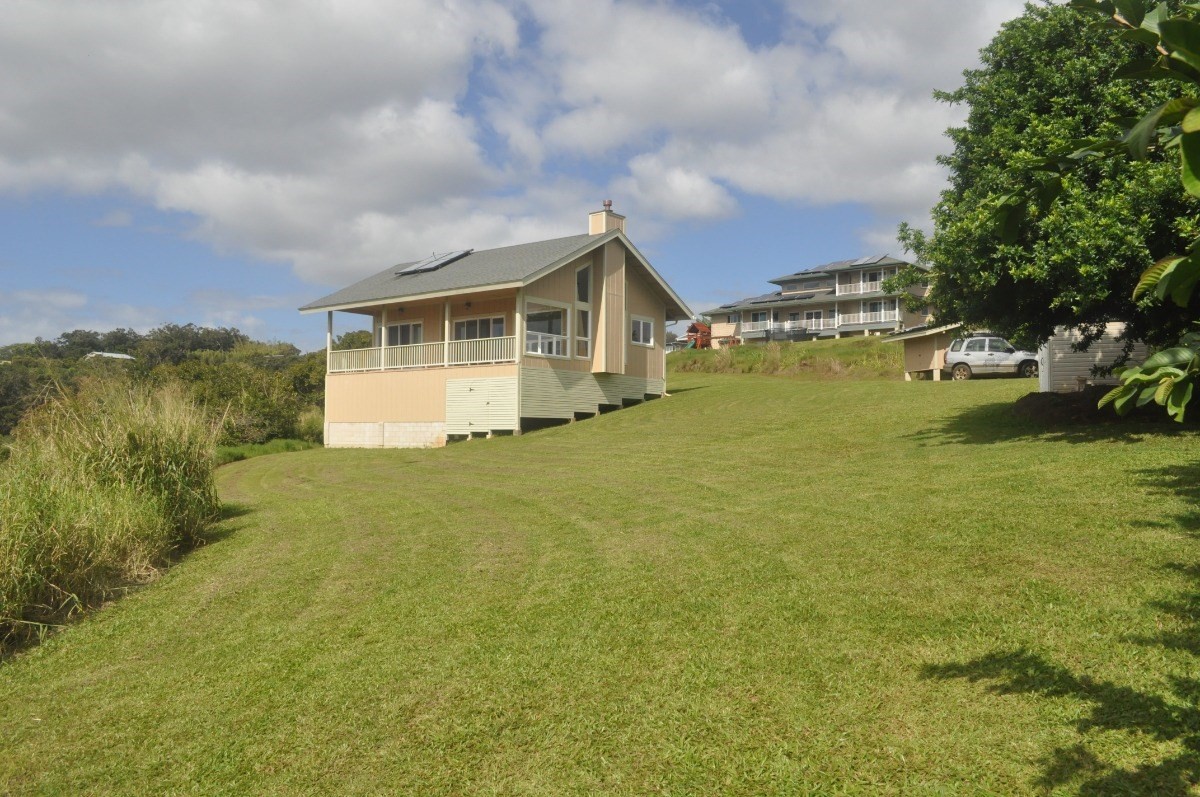 5495 A Puulima Road, Unit D Kalaheo, HI 96741 - Photo 13 of 24 a view of a house with a garden