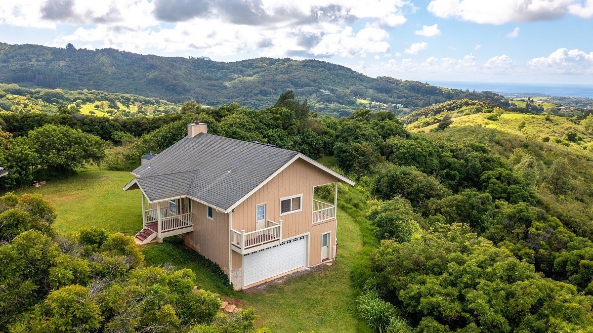 5495 A Puulima Road, Unit D Kalaheo, HI 96741 - Photo 15 of 24 a aerial view of a house with a yard