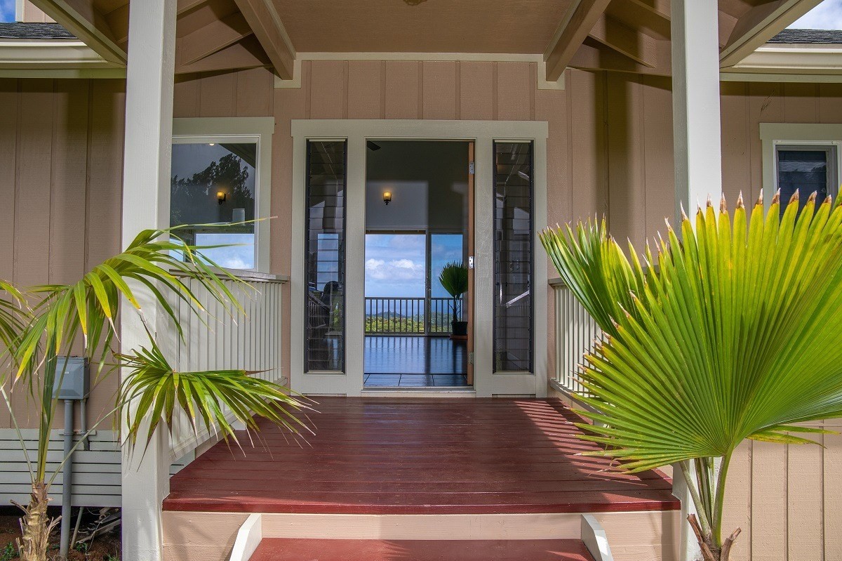 5495 A Puulima Road, Unit D Kalaheo, HI 96741 - Photo 3 of 24 a view of a house with a potted plant