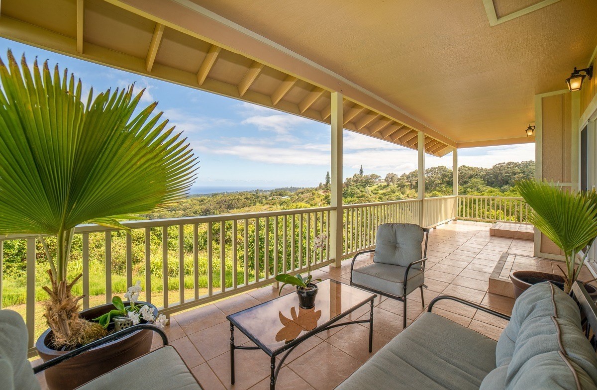 5495 A Puulima Road, Unit D Kalaheo, HI 96741 - Photo 8 of 24 a balcony with furniture and a potted plant