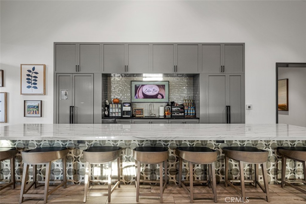 39504 Caladium Drive Temecula, CA 92591 - Photo 36 of 38 a view of a kitchen with granite countertop a counter top space cabinets and stainless steel appliances