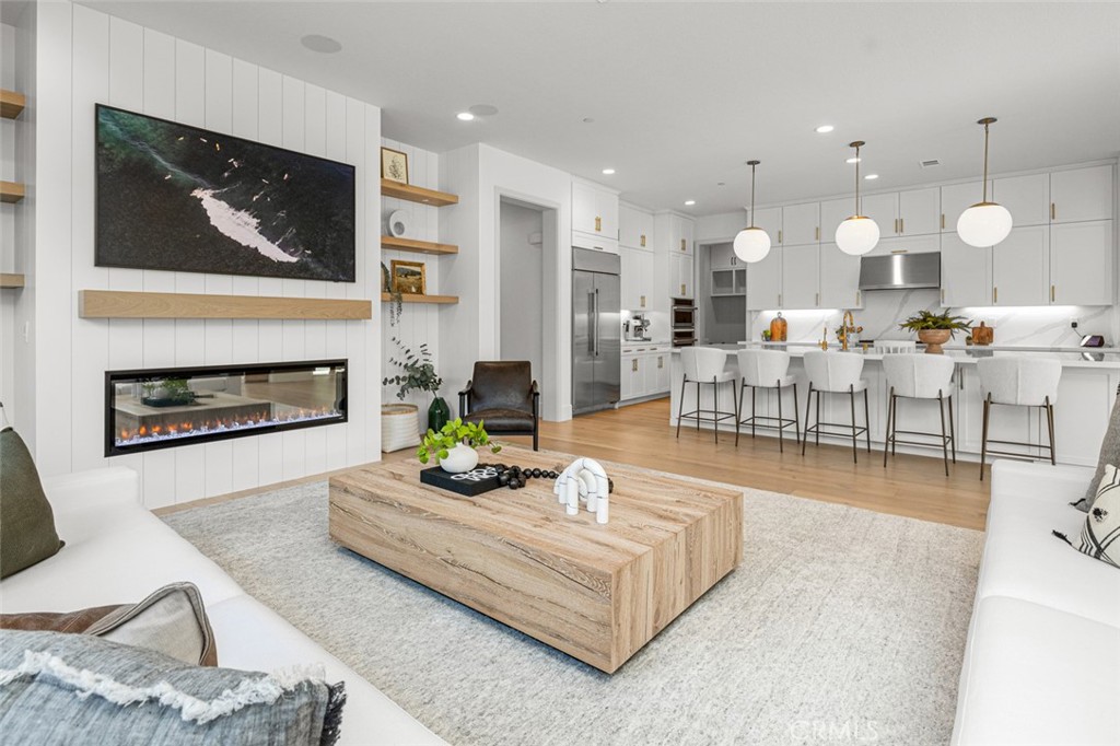 39504 Caladium Drive Temecula, CA 92591 - Photo 4 of 38 a living room with furniture and a fireplace
