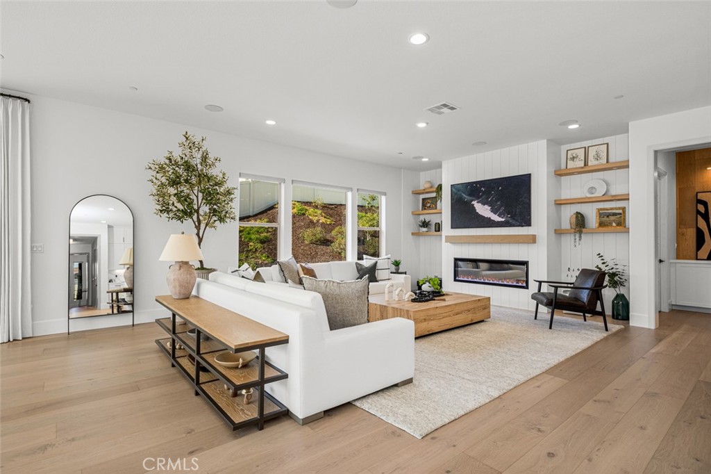 39504 Caladium Drive Temecula, CA 92591 - Photo 5 of 38 a living room with furniture and a flat screen tv
