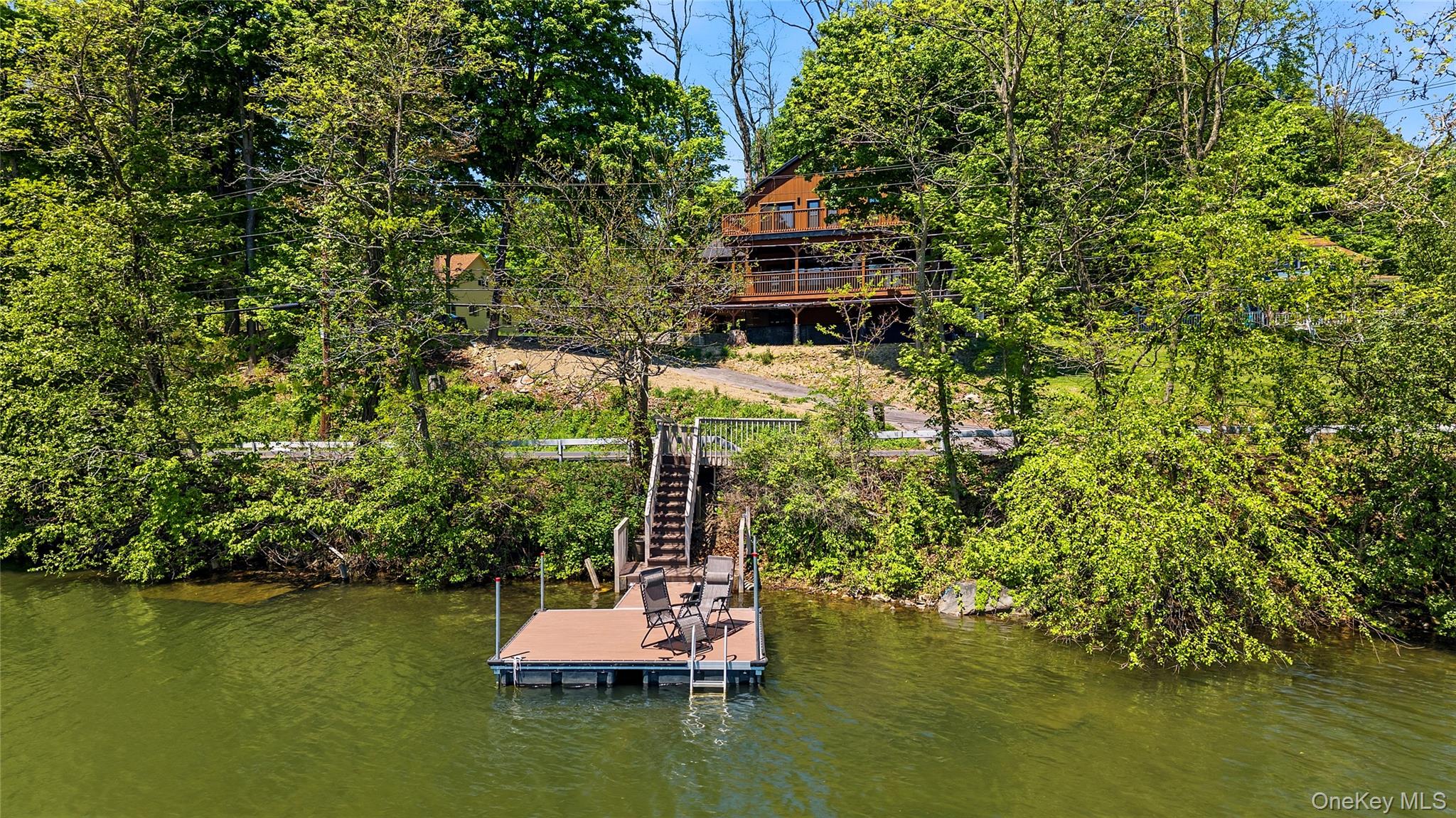 548 Lakes Road Monroe, NY 10950 - Photo 6 of 50 a small pool with lots of tress