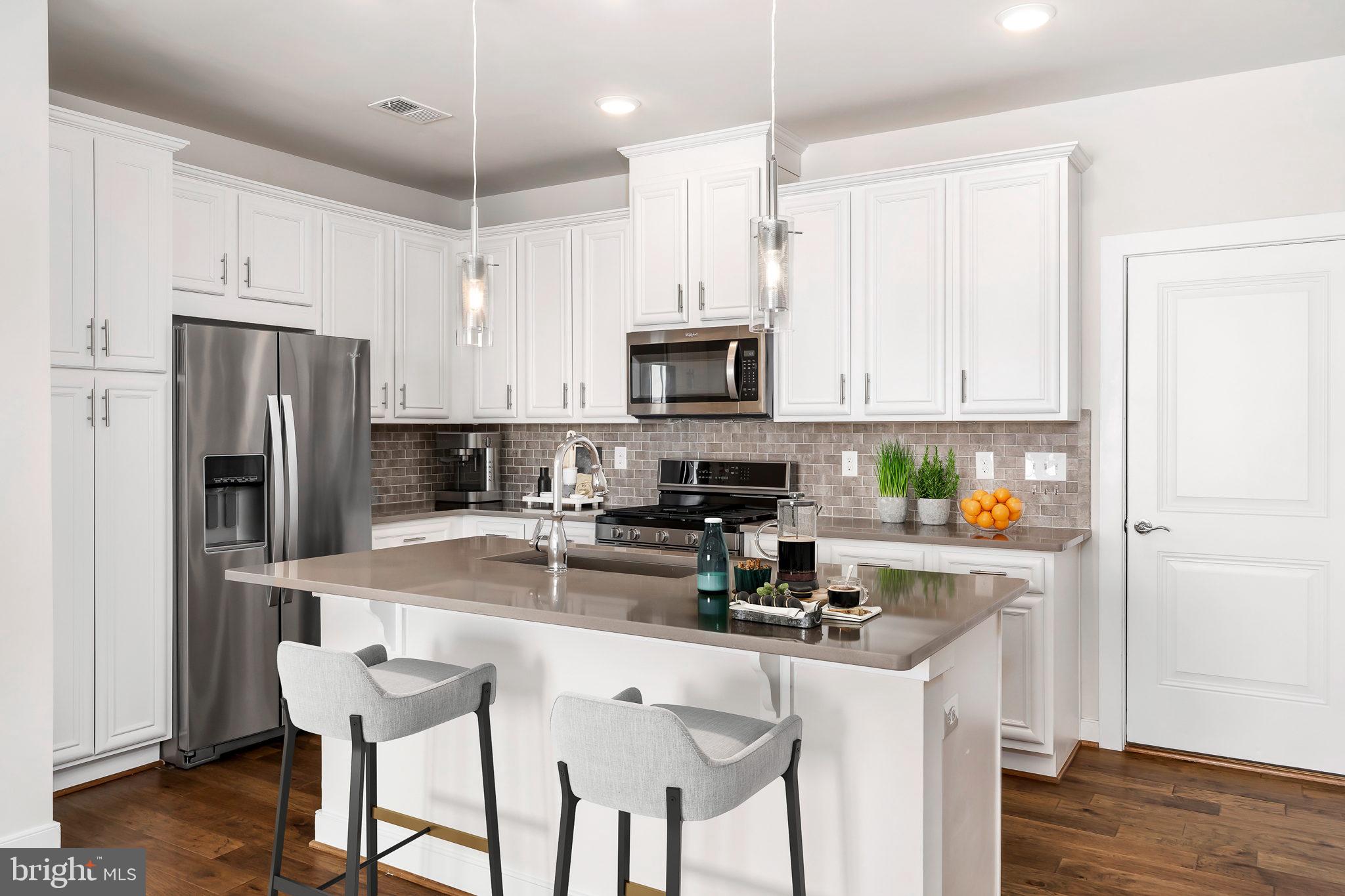 13330 Arrowbrook Centre Drive Herndon, VA 20171 - Photo 5 of 23 Quartz tops , backsplash, stainless appliances