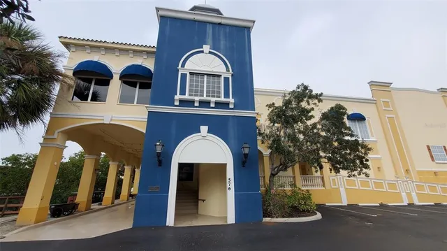 an aerial view of a house with outdoor space