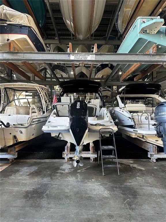 570 Blackburn Point Road, Unit 13 Osprey, FL 34229 - Photo 4 of 4 a view of car parking