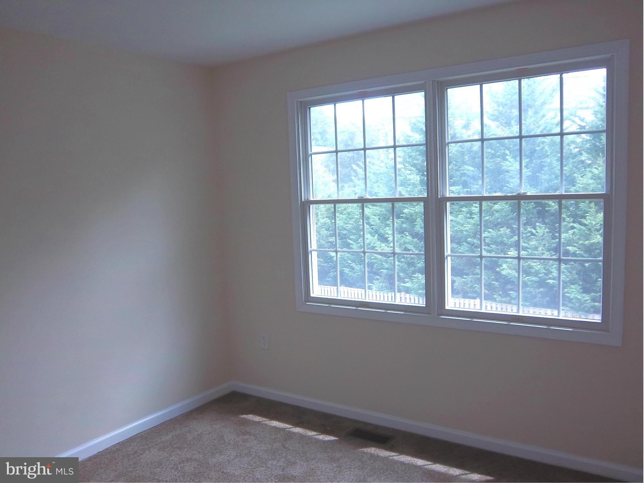 7917 Quarterfield Road Severn, MD 21144 - Photo 13 of 27 a room that has a window