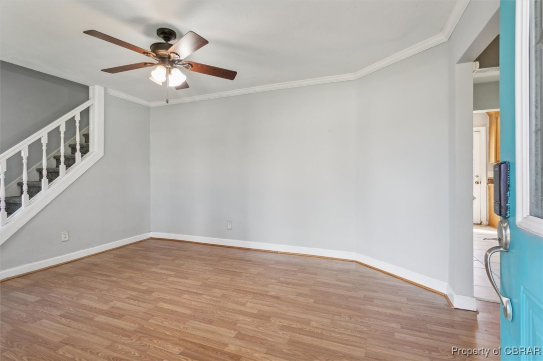 3810 Kecoughtan Road Hampton, VA 23669 - Photo 5 of 40 Empty room featuring crown molding, ceiling fan, and light hardwood / wood-style floors