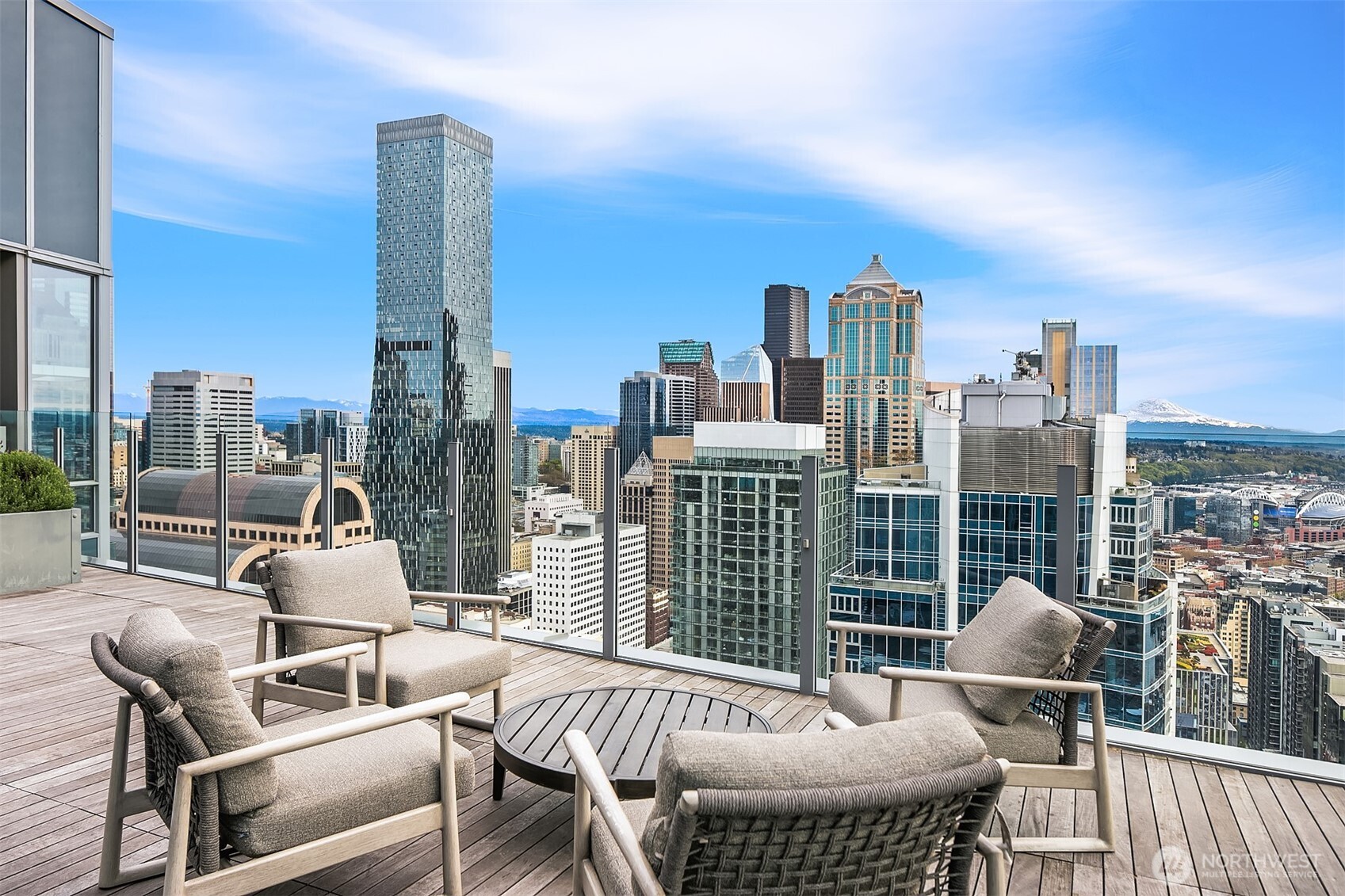121 Stewart Street, Unit 1304 Seattle, WA 98101 - Photo 13 of 25 a building outdoor space with patio furniture