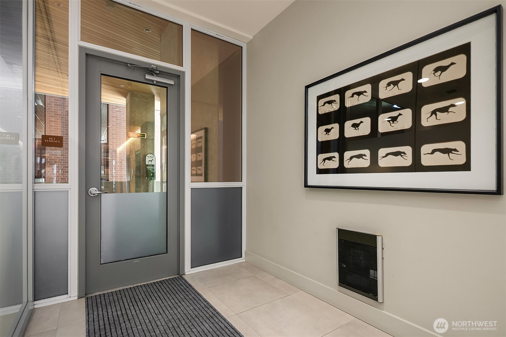 121 Stewart Street, Unit 1304 Seattle, WA 98101 - Photo 22 of 25 a view of elevator with a hallway