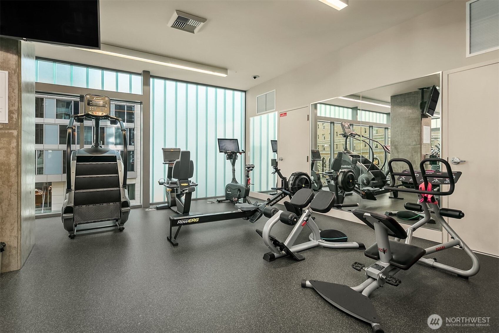 121 Stewart Street, Unit 1304 Seattle, WA 98101 - Photo 24 of 25 a view of a room with gym equipment