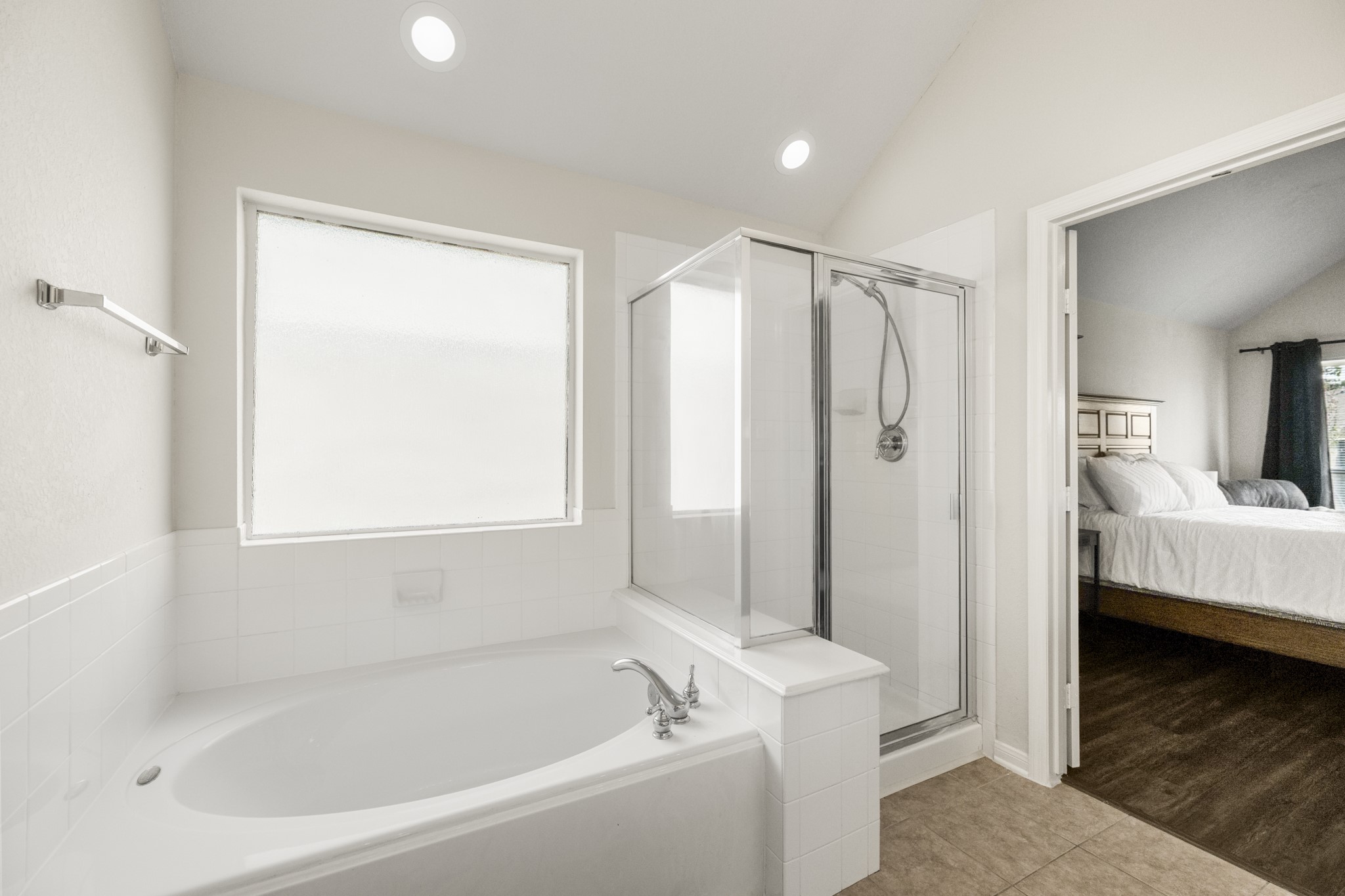 3422 Falcon Trail Court Spring, TX 77373 - Photo 20 of 35 a bathroom with a bathtub and a shower