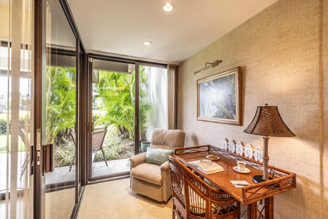 a bathroom with a granite countertop sink mirror and a