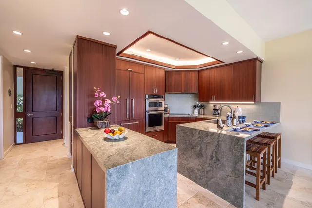 a kitchen with granite countertop lots of counter top space