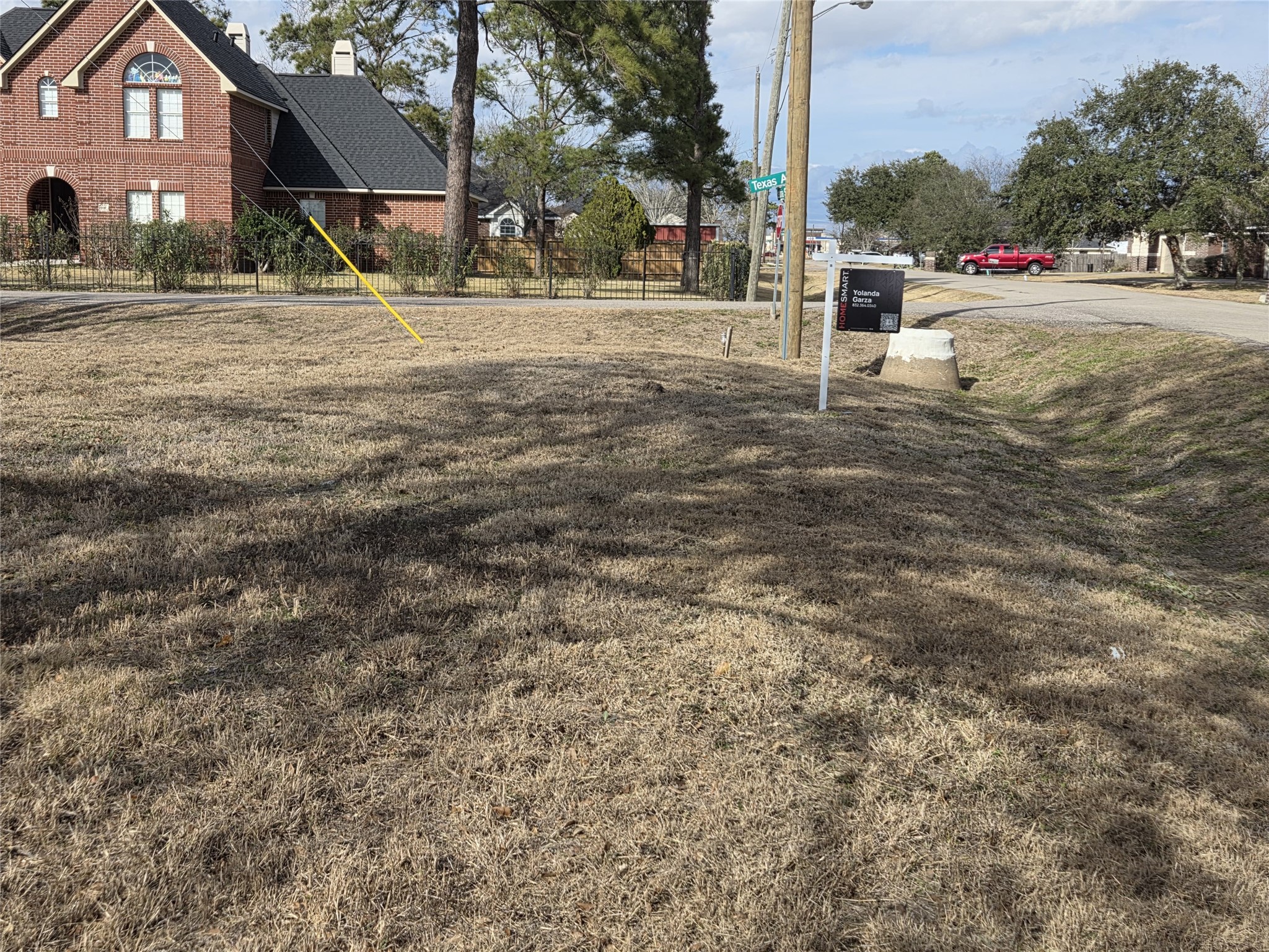 a street view with tall buildings and a street light