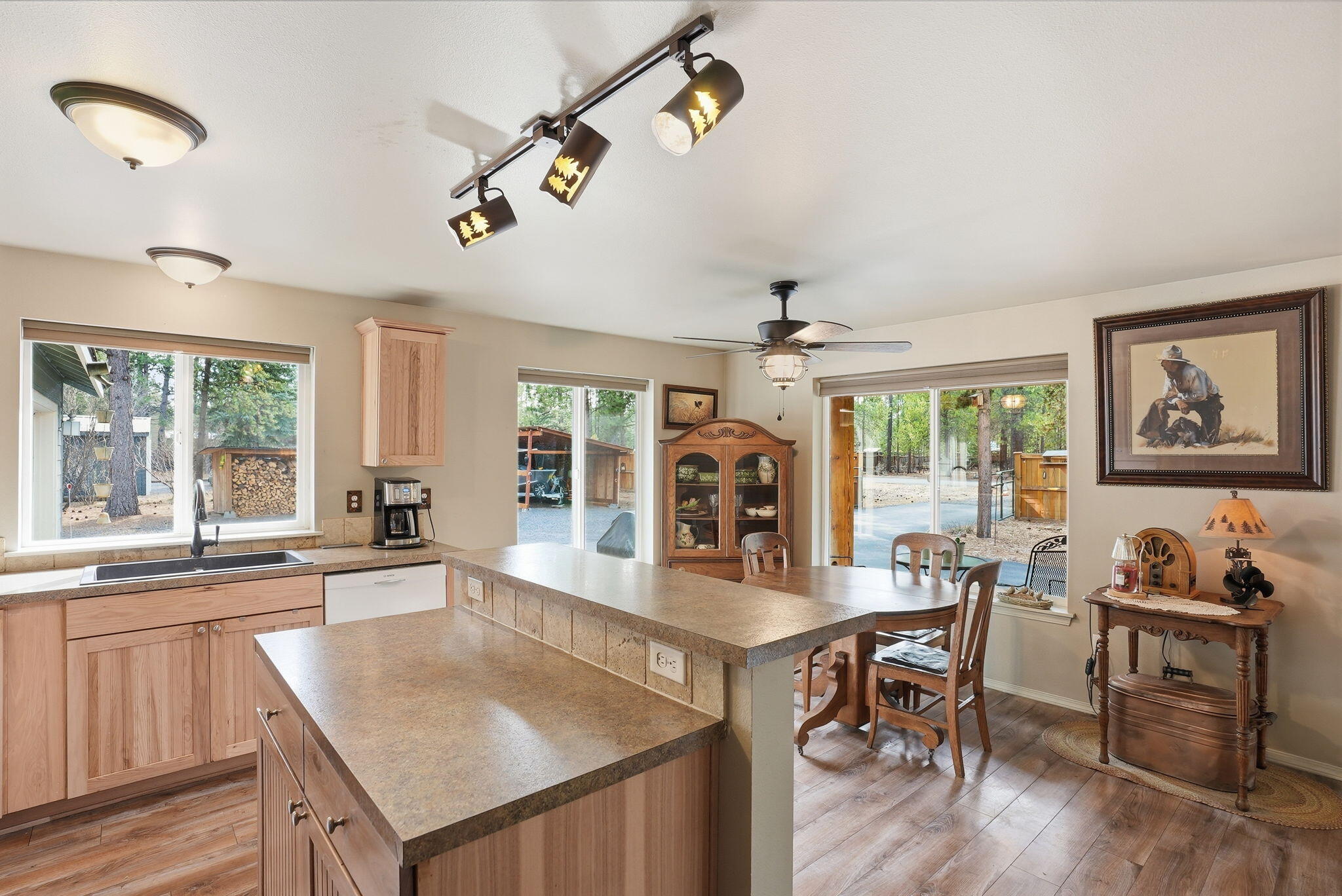 51432 Jory Road La Pine, OR 97739 - Photo 13 of 51 a dining hall with stainless steel appliances granite countertop a stove and a dining table with the kitchen view