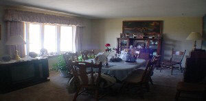 8325 Belvidere Road Caledonia, IL 61011 - Photo 3 of 5 a view of a dining room with furniture and window